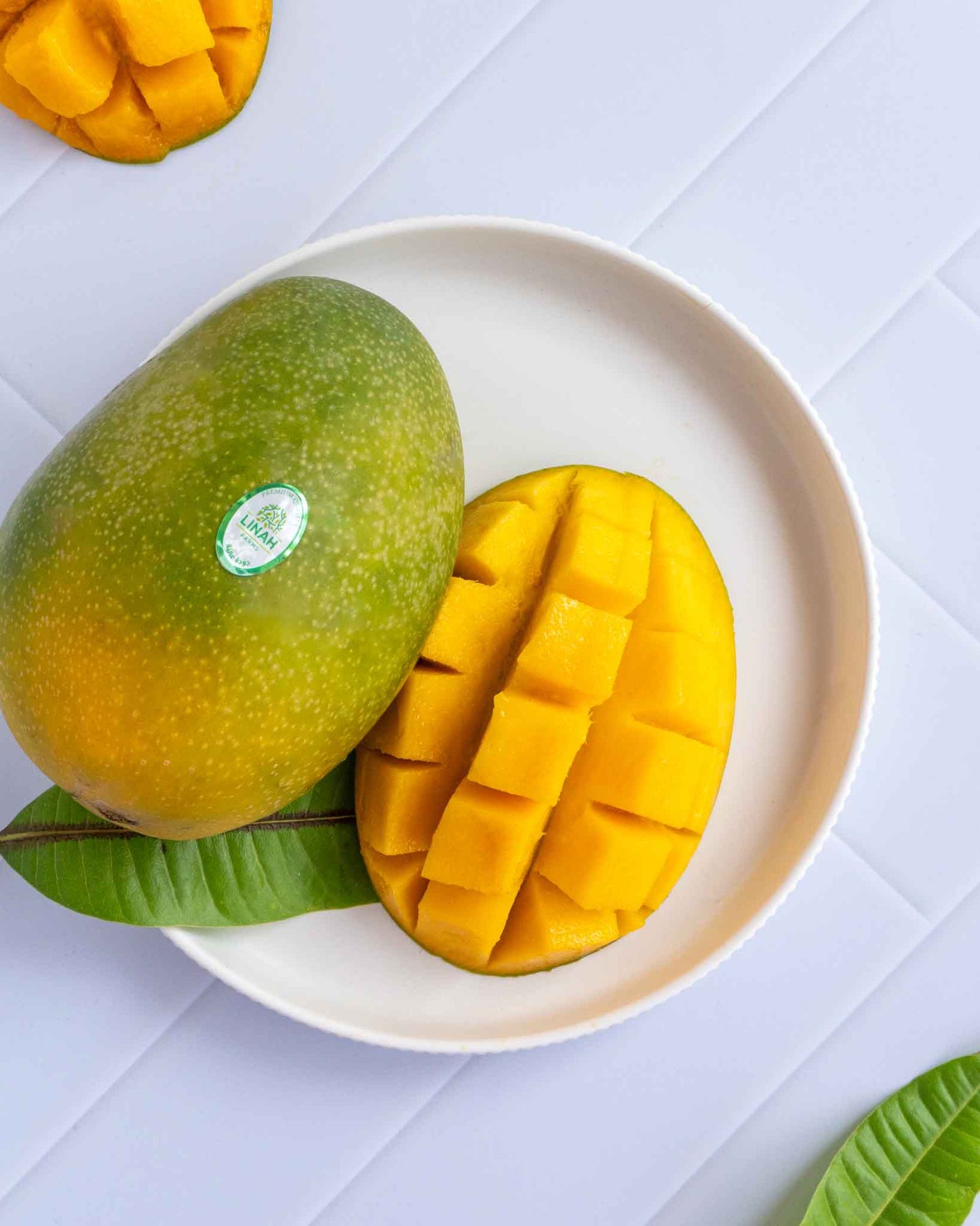 Sliced Keitt mangoes on a plate